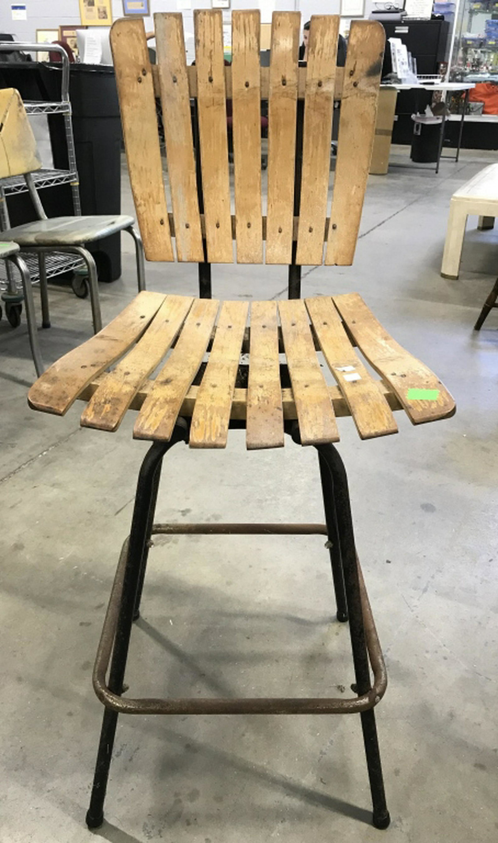 Vintage Wooden Stool W Backrest Stool has wooden seat: Stool has wooden seat and backrest. Legs of piece are black toned and metal. Piece appears to be vintage. Piece measures approx 38 inches tall 18 inches deep, 17 inches wide. bar stool home furnishing