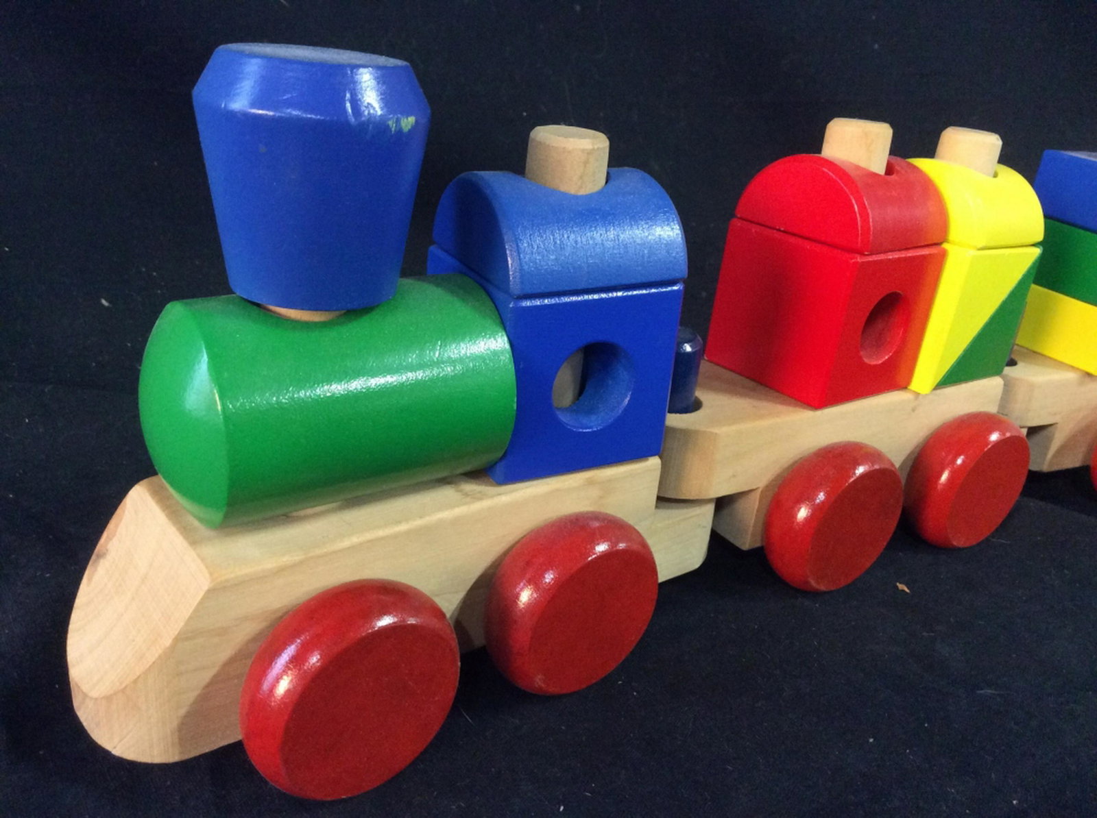 Colorful Wooden Toy Train Colorful wooden train in: Colorful wooden train in great condition, produced by Melissa & Doug. Approximately 18 inches in length. Wooden train, train, toy, children’s toy, colorful, Melissa & Doug Toys, buildable toys. 5