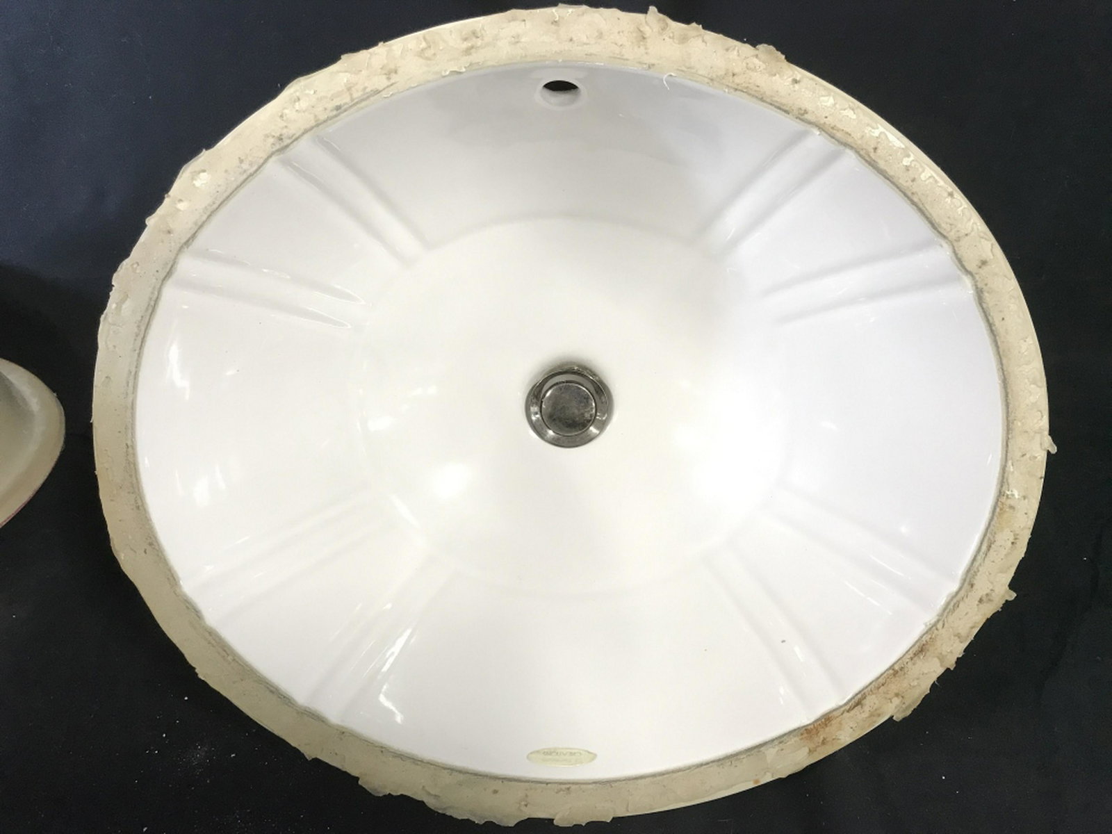 ST THOMAS CREATIONS Sink Basin Underside of basic reads: Underside of basic reads ST THOMAS CREATIONS. Piece measures approx 18 inches ling 17 inches wide9 inches deep without pipe. sink, hardware, bathroom fixtures 6