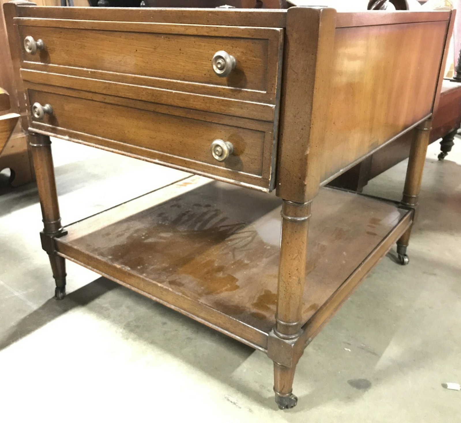 HERITAGE HENREDON Mahogany Side Table W Casters Side: Side Table has marking inside drawer which reads HERITAGE HENREDON. Tag on inside of drawer reads GENUINE MAHOGANY MAHOGANY ASSOCIATION INC. Drawer contains 4 knob style gold toned handles. 6. side ta