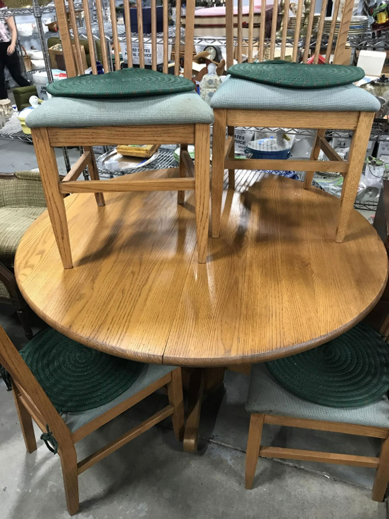 Vintage Circular Wood Table W 4 Dining Chairs Vintage: Vintage circular wood table on pedestal base and 4 dining chairs with cushioned seats. Table measures approx 48.25 inches in diameter by 30 inches in height. Extension leaf for table measures approx 1