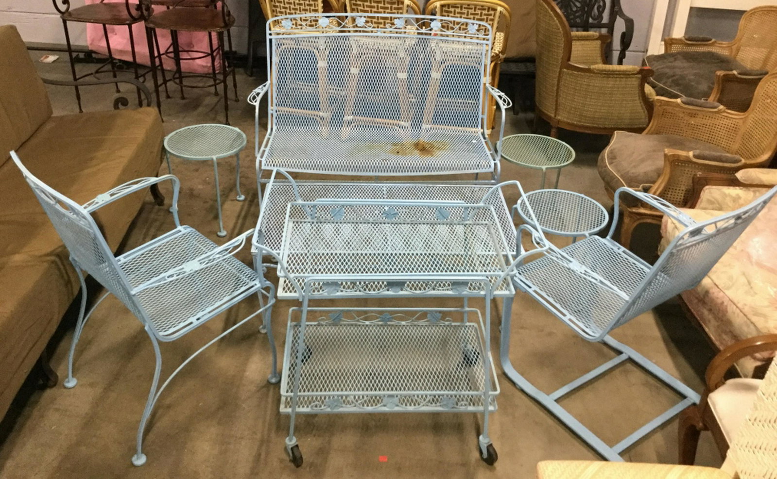Lot 7 Blue Toned Outdoor Furniture Set Lot includes 2: Lot includes 2 armchairs. 1 loveseat, 1 Coffee Table, 1 Beverage cart, and 3 side tables. Loveseat Measures approx 47 inches long 37 inches tall 23 inches deep. All pieces have evident weathering. gar