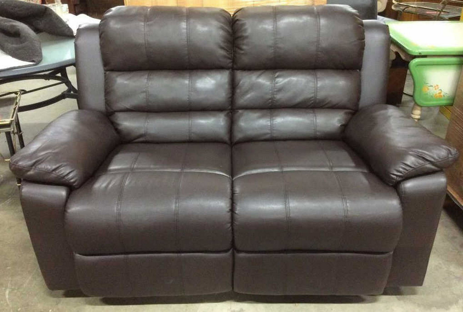 Set 2 Leather Loveseat & Recliner Lot includes 1: Lot includes 1 loveseat & 1 Recliner. Each piece has a chocolate tone. Loveseat Measures approx 38 inches tall 59 inches long, 39 inches deep. home furnishings, home accent and furnishings, living roo