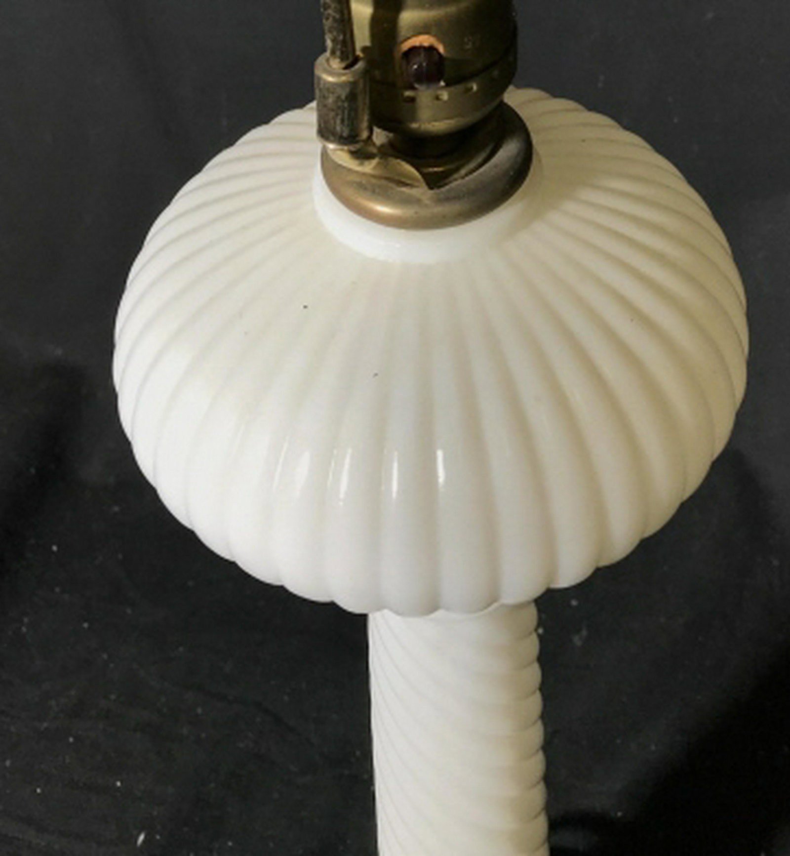 White vintage lamp White vintage lamp with lightbulb: White vintage lamp with lightbulb still attached. Loose hardware where the plug is. Old outlet plug. Stands at approximately 31 inches tall. Base is approximately 5 inches in diameter. Vintage lamp, w