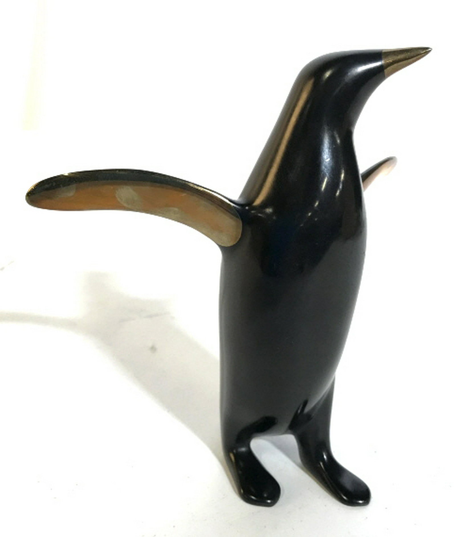Stone And Metal Penguin Figural Signed illegibly and: Signed illegibly and numbered underside, ht app 6 inches, animal statuary, home decor, penguin figural, arts and crafts figural.