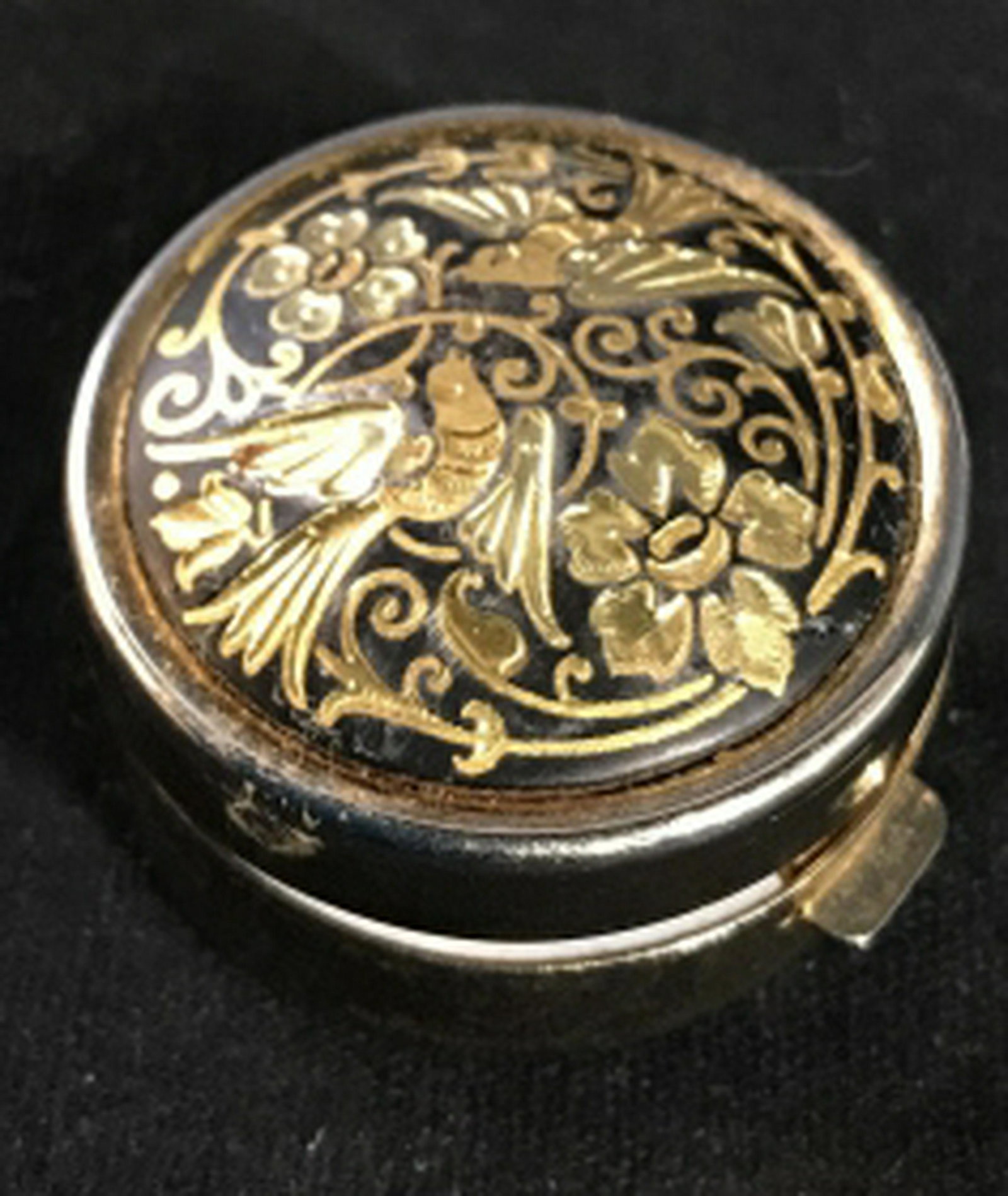 Silver and Gold Toned Pill Box Lined and intricate of: Lined and intricate of bird motif, diameter app 1.5 inches, pill box, painted design, vanity accessory pill box