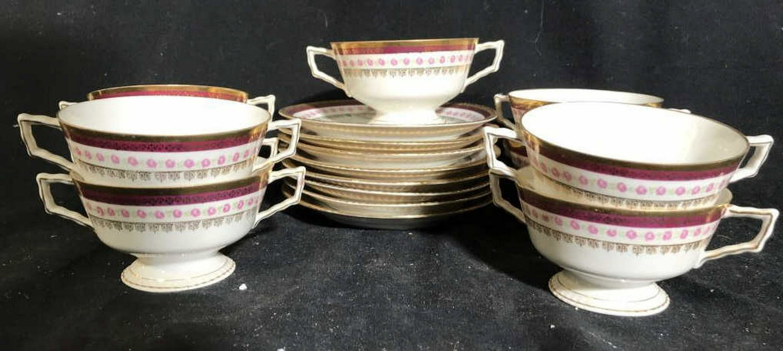 Antique H&M’s Co, Germany Porcelain Set Two Handled cup: Two Handled cup with saucer set, marked trademarked u deride, Set includes 8 saucers diameter app 5.75 inches and 9 bowls/cups, antique porcelain table ware, tea service, coffee service, porcelain tab