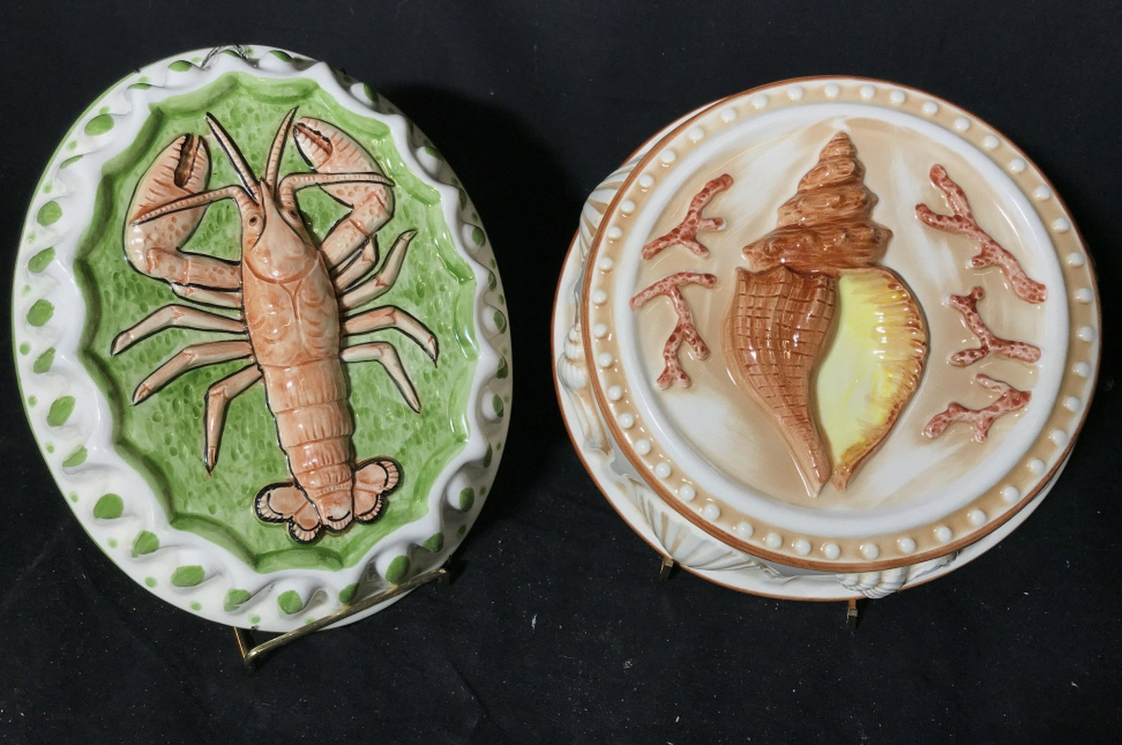 Sea theme hanging wall decorations,pottery Ceramics,: Ceramics, pottery, porcelain, Sea themed hanging wall decorations. Pictured on wall hangings are seashells, coral, and a lobster. Seashell hanging measures approximately 9 inches in diameter and 4 inc