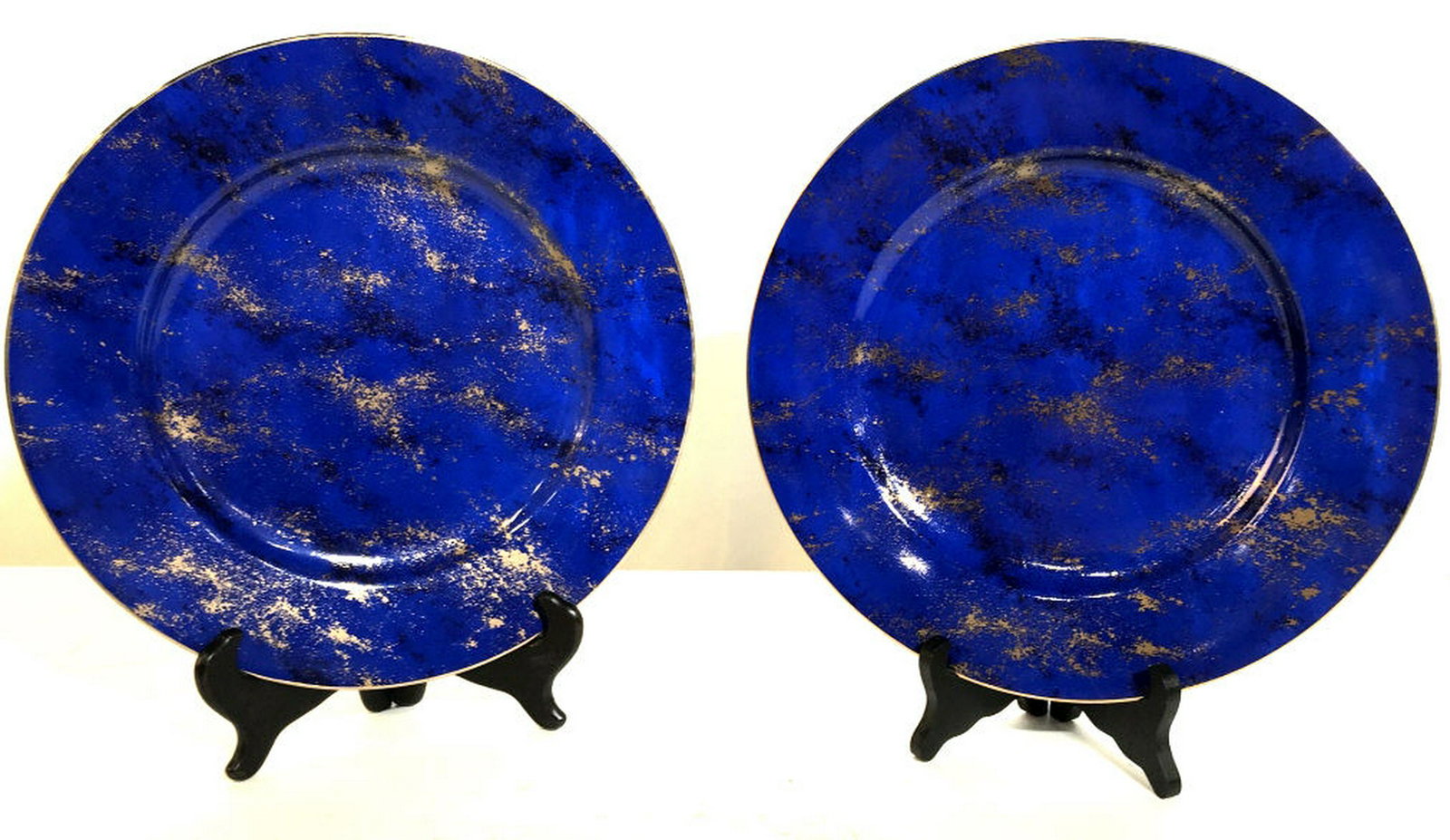 Pair Neiman Marcus Gold tnd Paint Splatter Plates Made: Made Exclusively for Neiman Marcus with Gold tnd Rim and Gold tnd & Navy Blue Splattered Paint on Royal Blue Background. 12 in. No marks. Home Plate Decoration, Serving Plates, Shelf Decor, Neiman Mar