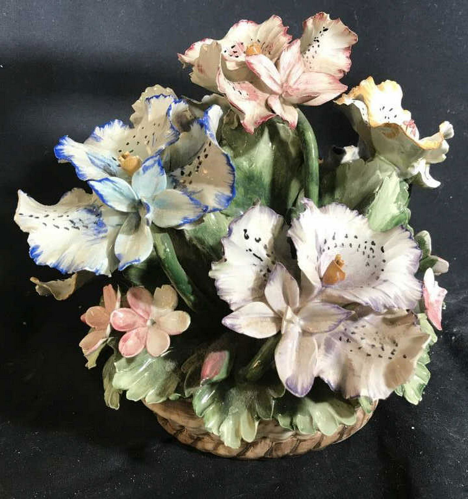 Porcelain Capodimonte Floral Basket Bouquet Porcelain: Porcelain hand crafted hand painted floral bouquet, some chips, tableware Measures app ht 11 inches diameter app 16 inches. Sculptural porcelain, decorative accessory, shelf piece, floral decor, colle