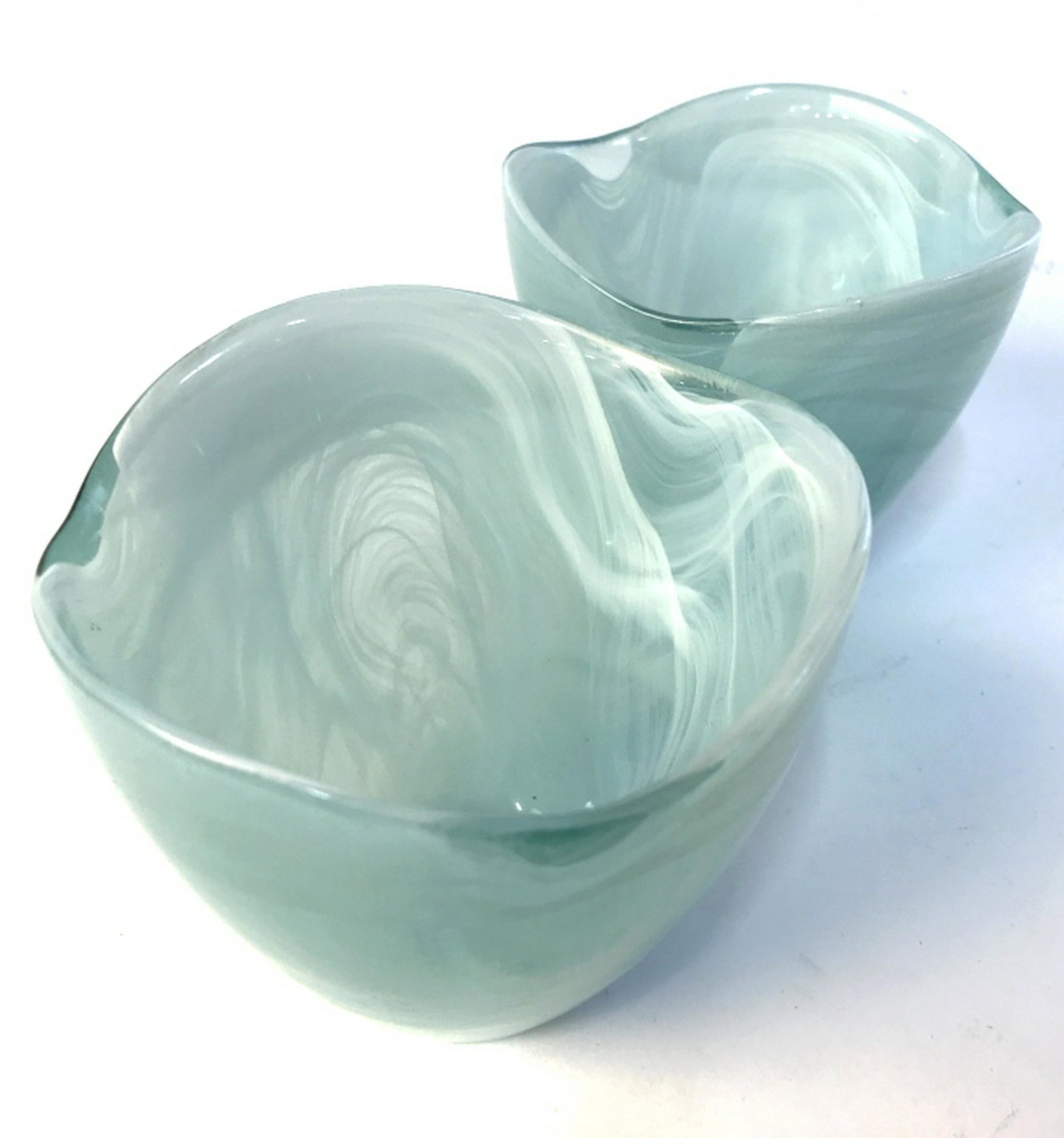 Pair Light blue crafted glass Trinket Dishes: Bowl/vase/tableware vessel. Light blue/teal in color. Vessel stands at approximately 3 inches in height and 4 inches in width. Tableware, Glass, Decorative, Decorative pieces, home decoration, trinket