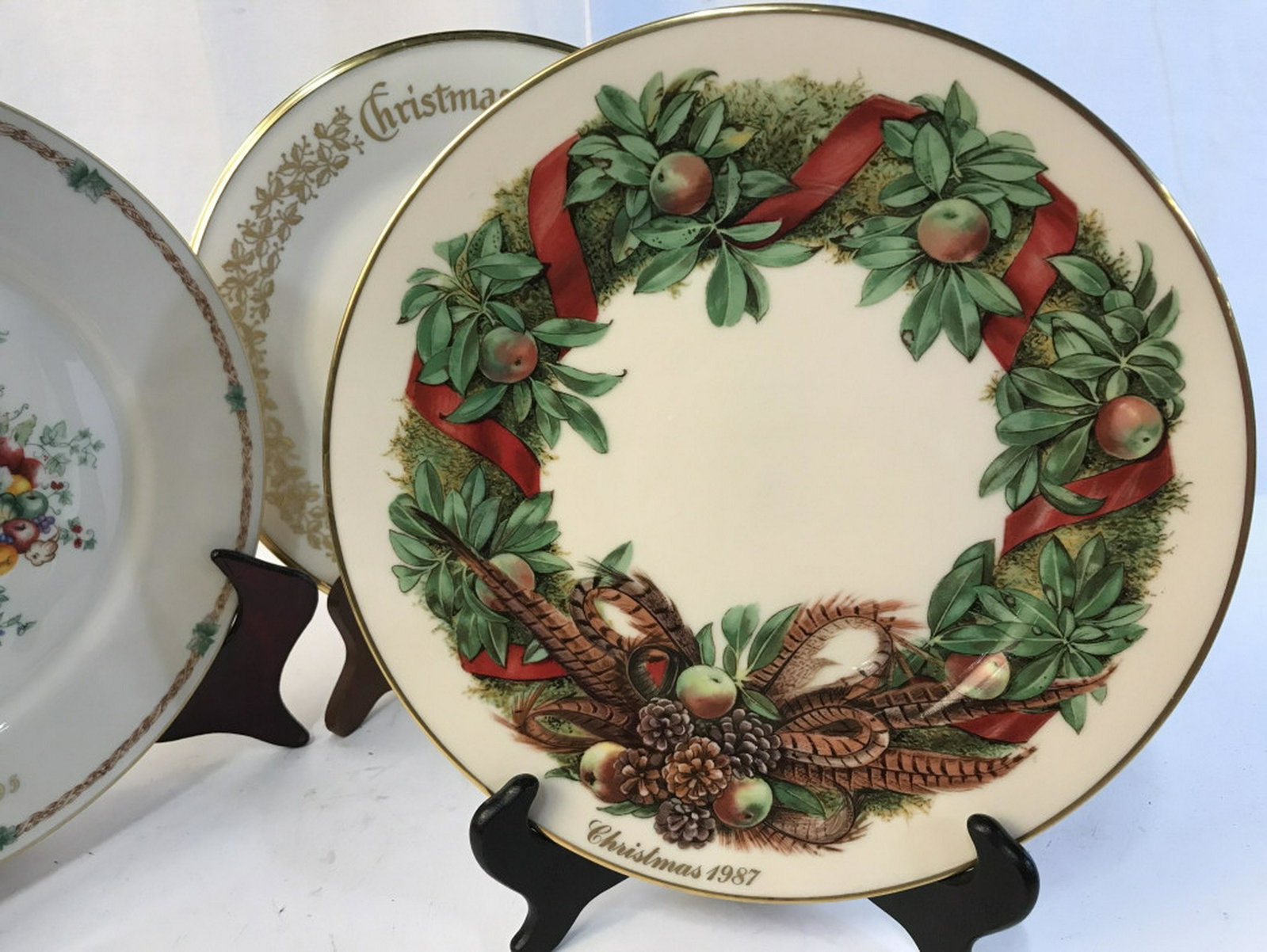 Holiday porcelain plates set of 5 5 vintage porcelain: 5 vintage porcelain plates with a unique holiday design on each. Each plate measures approximately 10.5 inches in diameter. Plates are produced by Lenox and are for decorative purposes only. Porcelain