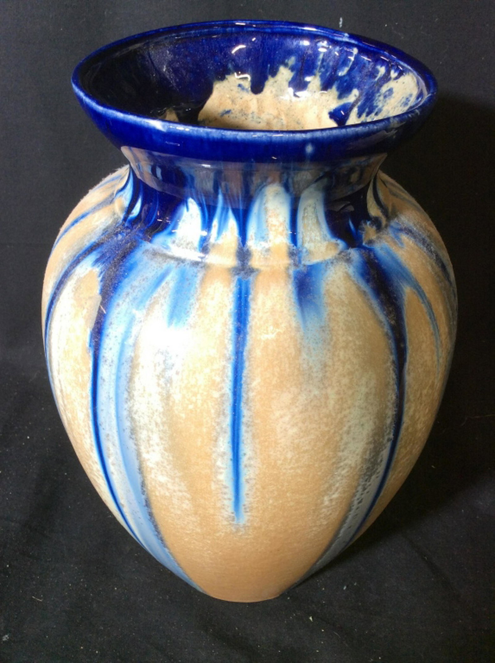 Ceramic Belgian Vase Underside of piece is marked: Underside of piece is marked BELGIUM. Piece has sand tone with blue toned top. Piece measures approx 12 inches tall 8 inches wide. vase, vessel, tableware, decorative arts and accessories 6