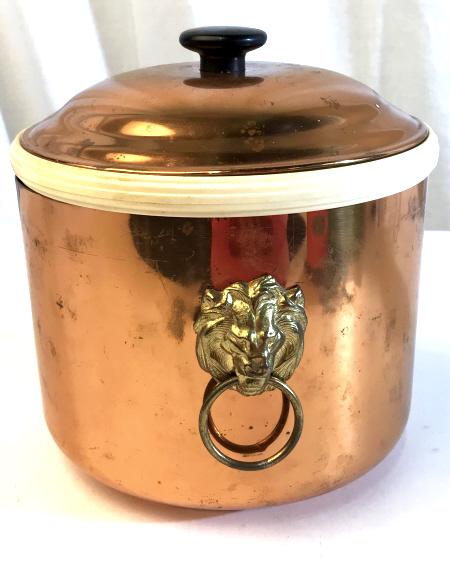 COPPERCRAFT GUILDED Vintage Ice Bucket: Copper guilded Ice Bucket with removable inner bucket. Gold colored lion handle accents. Branded Coppercraft GUILDED Taunton Mass. on the bottom. Stands at approximately 8 inches in max height. Is app