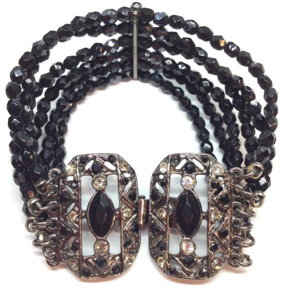 BEN AMUN Rhinestone Beaded Bracelet: Multi stranded bracelet, black toned beads and rhinestones, possibly glass possibly composite, vintage Art Deco inspired design, silver toned metal. Measures approx 2 1 /2 in in diameter. Fashion acce
