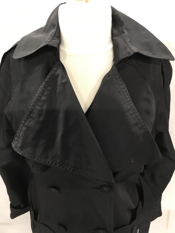 KENNETH COLE NY Belted Trench/ Rain Jacket: Three season Jacket by Designer Kenneth Cole. Size S. 100% polyester exterior and lining. Double breasted, large front pockets, interior close button. Arm length, 27.5 in. Measured from mid shoulder.