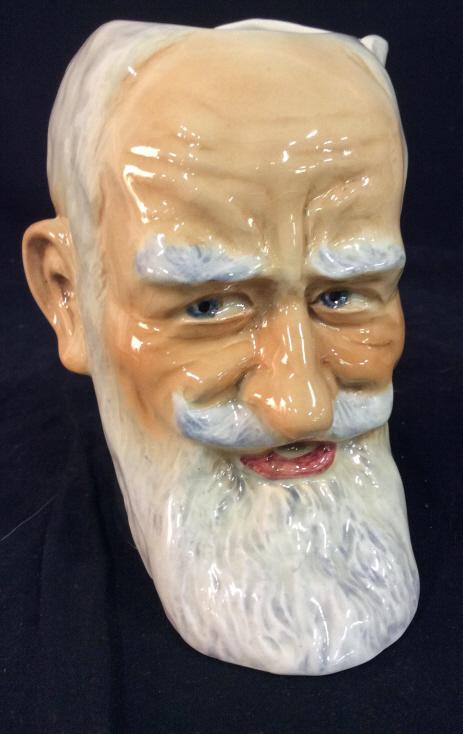 Sylva C Hand Painted Ware Mug Made in England: Hand Painted Ware, Stamped George B Shaw, Toby Style Mug, Picture Of Gentlemen with Mustache & Beard. Feather Style Handle. No issues noted Size 6 inches in Height, width 6 inches, approximately. Coll