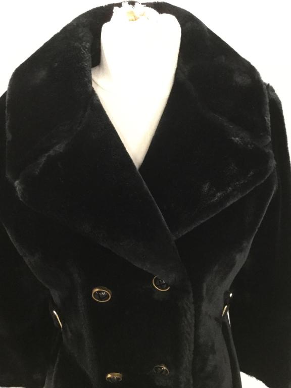 Double Breasted Plush Coat w Side Belt Accents: Finely tailored plush coat. Very soft and velvety. Interior lining well stitched. Must launder like a fur coat. Tag clean instructions. Length, 37 in. Arm length, 22 in. from seam. Waist, a loose 36-3