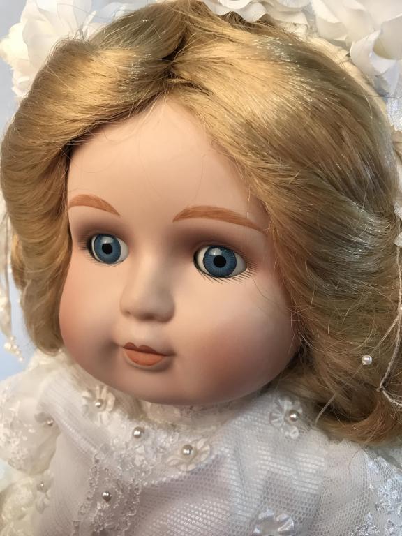 Vintage BETTY JANE CARTER PORCELAIN MUSICAL DOLL: Doll is Sarah no. 973. Plays “Wedding March”. Stands at approximately 22 inches tall. Still in bag. Original tag still on doll. Tag reads “An original limited edition musical porcelain doll by B