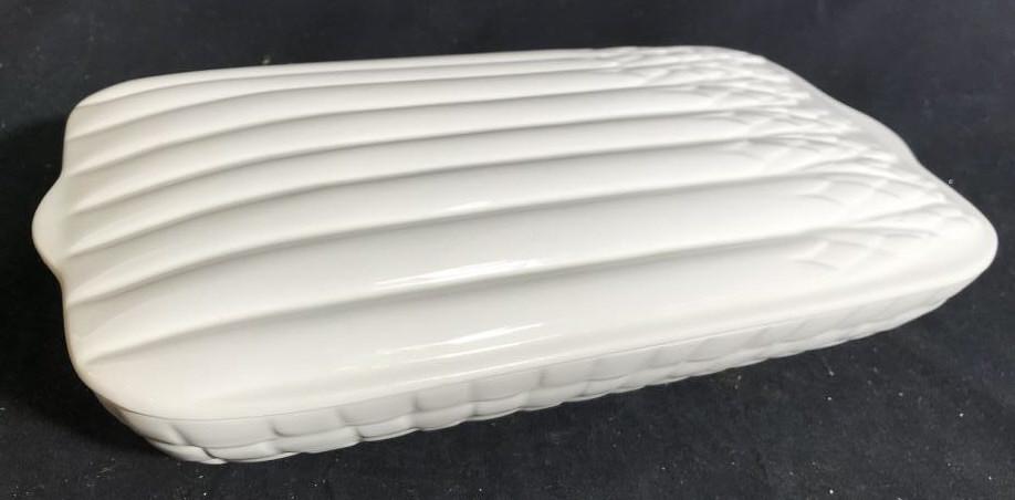 White Ceramic Porcelain Asparagus Dish: tableware, serving dish, serving vessel Lidded Vessel with asparagus forms, marked illegibly on underside, table ware measures app ht w lid 4 inches, top app 13 by 8 inches