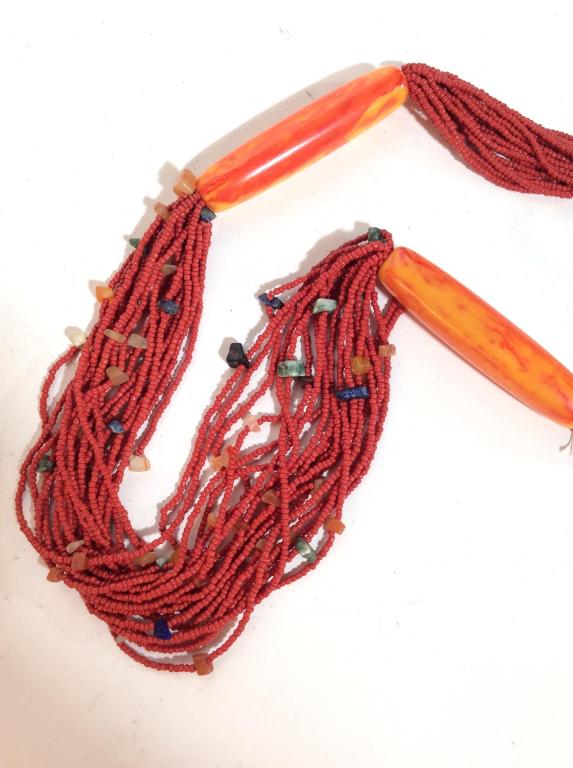 Bakelite Bead Statement Necklace: Red toned multiple strands of seed beads, orange toned cylindrical beads, appear to be bakelite, natural stone details, Measures approx 14 in long. Women’s vintage costume estate jewelry, ladies fas