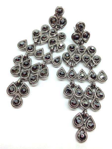 Chandelier form Marcasite Style Earrings: Silver toned metal, Marcasite style rhinestones, Chandelier form, tear drop shaped links. Measures approx 2 1/2 in long. Women’s vintage costume estate jewelry, ladies fashion accessory, wearable ac