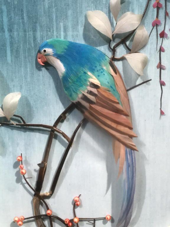 Framed Feathered Bird in Relief Artwork: Bird and tree branches coated in feathers, set in Relief in frame. Measures approx 12.25 inches squared in height and width, 1 inch in depth. Decorative wall art, unique wall art. 7