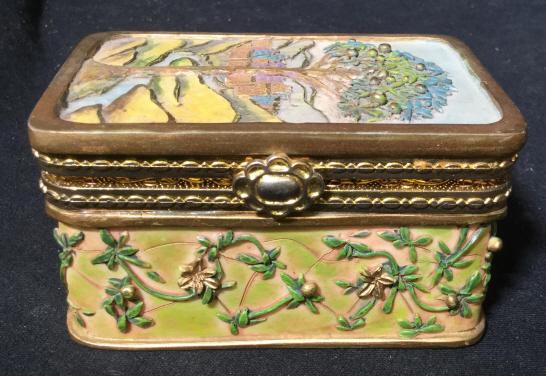 Painted Mixed Material Keepsake Box: Lidded Box Brass Framed, Velvet Lined, Lid sides painted and molded material, possibly ceramic, trees and village scene, closed box measures 1.5 inchesht, Top app 3 by 2 inches, Hand Made, Decorative 