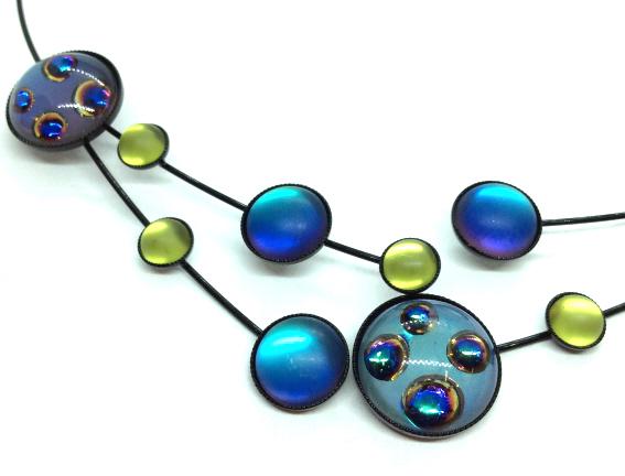 Artisan Made Necklace w Iridescent Cabochons: Black toned metal wire necklace with circular green and blue purple cabochons, Cabochons possibly glass or composite material. With open front design, measures app 6 1/2 in long from back to front, Wo