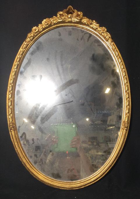 DiscoveryFromWildWood Oval Gilt Wood Mirror Italy: Carved wood mirror, gold leafed, label on back reads Discolvery from Wildwood, Italy, measures app 26 by 19 inches, decorative arts and accessories, hanging mirror, wall mirror, home accent, home deco