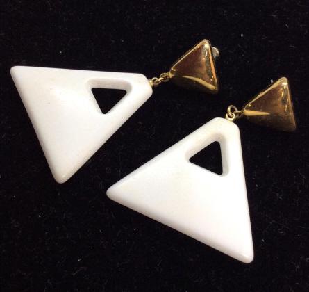 TRIFARI Retro Earrings: Vintage Trifari Earrings, Pierced earrings, brass toned metal triangle post, hanging white toned composite material pendants. Measures approx 2 in long. Women’s vintage estate costume jewelry, ladie