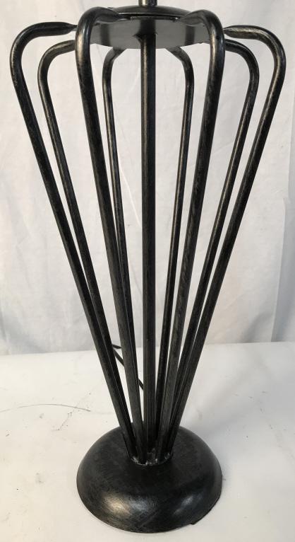 Black Toned Metal Lamp: Lamp has black tone. Base & body of lamp is metal. Piece has minimalist style. Includes black toned Loop style metal finial. Measures approx 32 inches tall 9 inches wide. tbale lamp home decor, home a