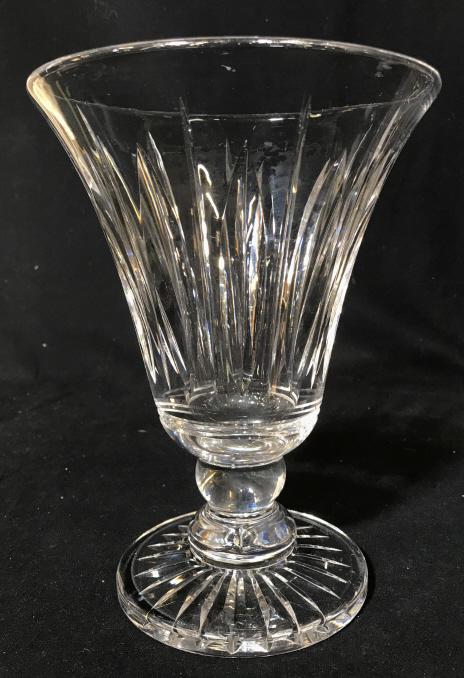 Stuart English Cut Crystal Pedestal Vase: Stuart English Cut Crystal Pedestal Vase with vertical cut design on vase and cut star pattern on base, etched on underside Stuart England, measures approximately 8.75 inches tall x 6.5 inches in diam