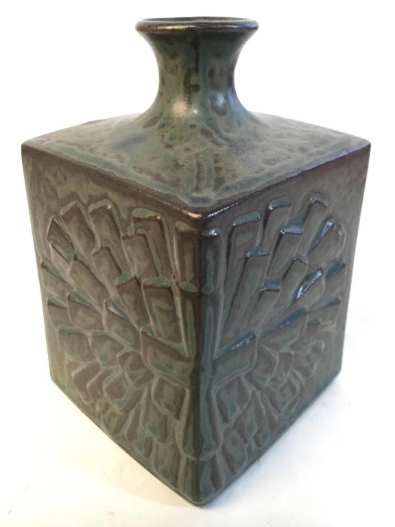 Vintage Cube Shaped Ceramic Vase: Vase is ceramic. Piece has a dark green slate tone. Piece has a cube like shape. Measures approx 5 inches tall 3 inches wide & deep. tableware, bud vase, vessel, ceramic pottery, shelf piece, decorati
