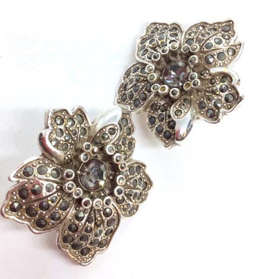 Floral rhinestone Ear clips: Vintage ear clips, Sculptural floral form, rhinestone and Marcasite details. Some missing pieces. Measures approx 2 in in diameter. Women’s vintage estate costume jewelry, ladies fashion accessory, 