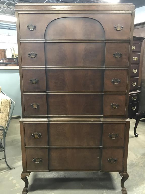Vintage Wood Highboy Dresser: Verso is marked for T. C. F. CO. 6 drawers in total. Dresser sits atop cabriole legs. Brass hardware & dovetail joints. Measures approx 61.25 inches in height by 34.35 inches in width by 18 inches in 