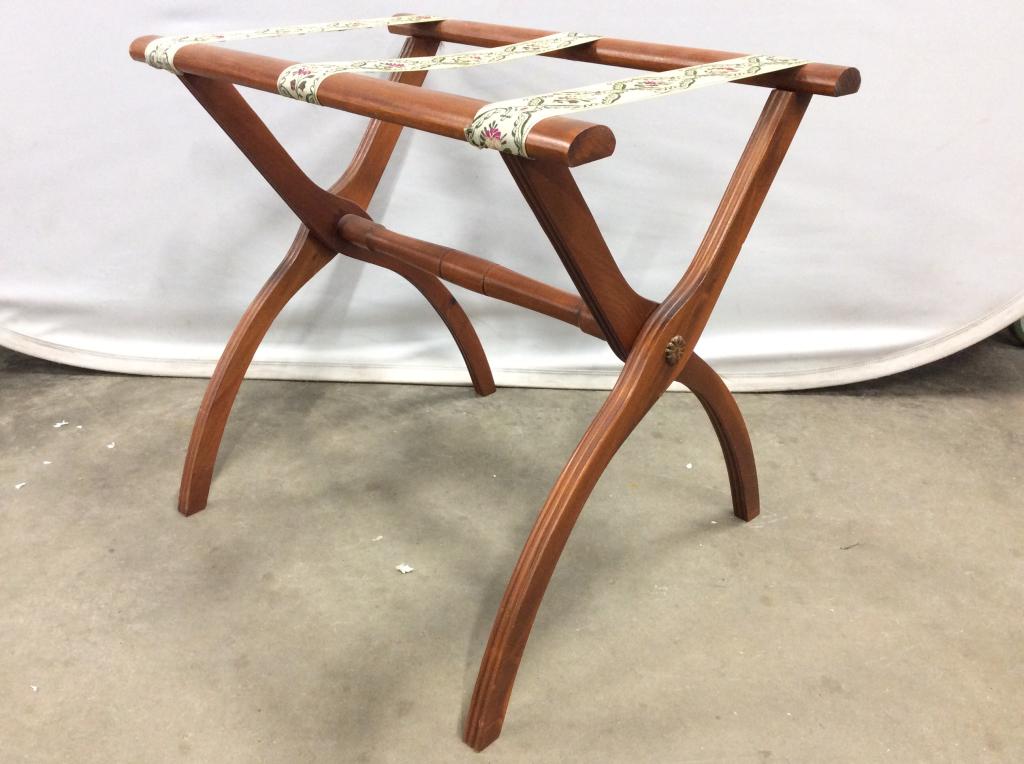 Vintage Wooden Luggage Rack: Luggage rack is wooden. Contains 3 floral and leaf detailed straps. Piece measures approx 20 inches tall 22 inches long 15 inches deep.luggage rack, guest room furnishings, home accent and accessories
