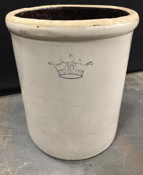 French Provincial Stoneware Crock Planter: Planter is dove gray in tone with blue tone stamp of the number 10 within a crown. Planter measures approx 17.5 inches in height by 15 inches in diameter. Some surface wear like imperfections in finis