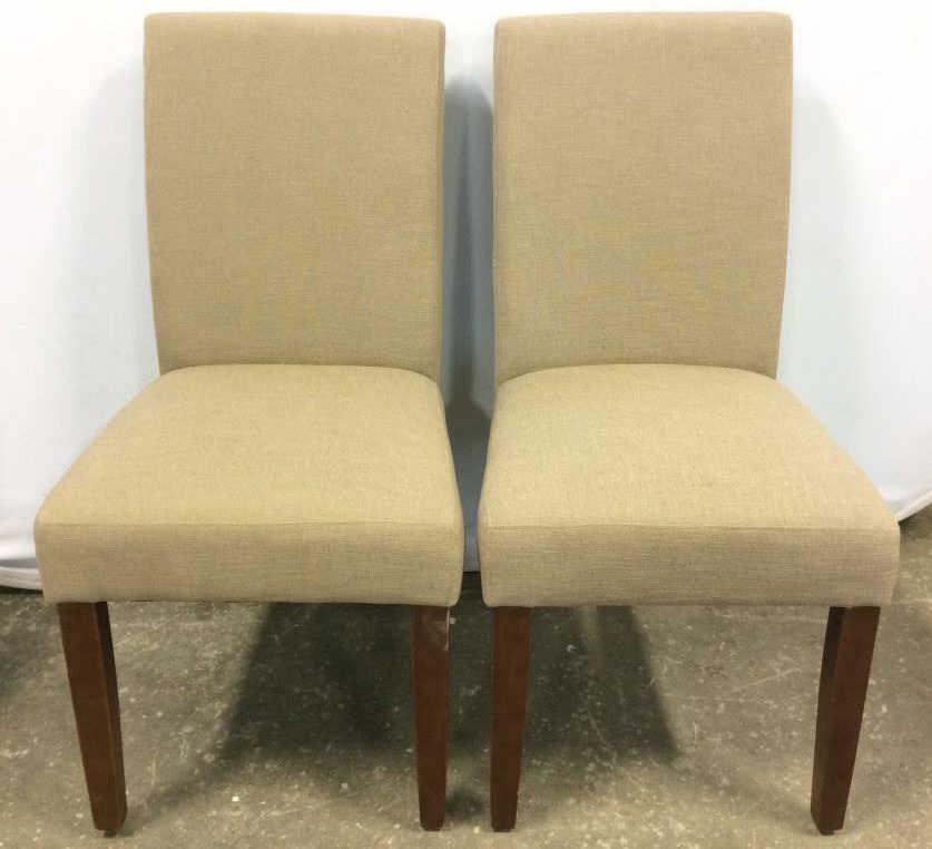 Pair Sand Toned Side Chairs: Chairs are sand toned. Each has 4 chocolate toned wooden chairs. Pieces measure approx 38 inches tall 18 inches wide 26 inches deep. Side dining chair, Upholstered chair, dining room furniture, kitche