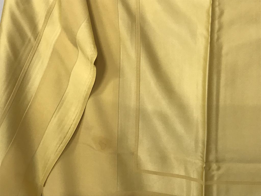 Lot 2 Dry Cleaned Tablecloths/ Fabrics: Square Fabric Tablecloth. Hand Sewn. Border is cut on the bias. 35 x 35 in. Fabric Type unknown. Other Tablecloth is possibly silk/ satin. 63 x 113 in. Has a bit of odor, needs cleaning, Up cycle Clot