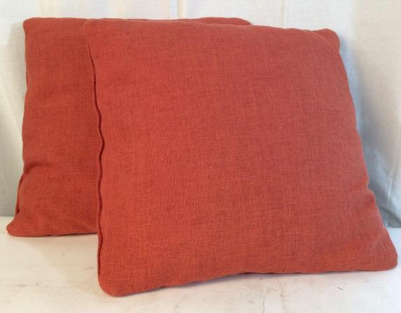 Pair ORANGE decorative toss pillows: 2 orange decorative couch pillows. Pillow cases have a zipper closure. Measures approximately 20 by 20 inches. Pillow cases are likely a canvas material. Decorative pillows, canvas pillows, orange pil