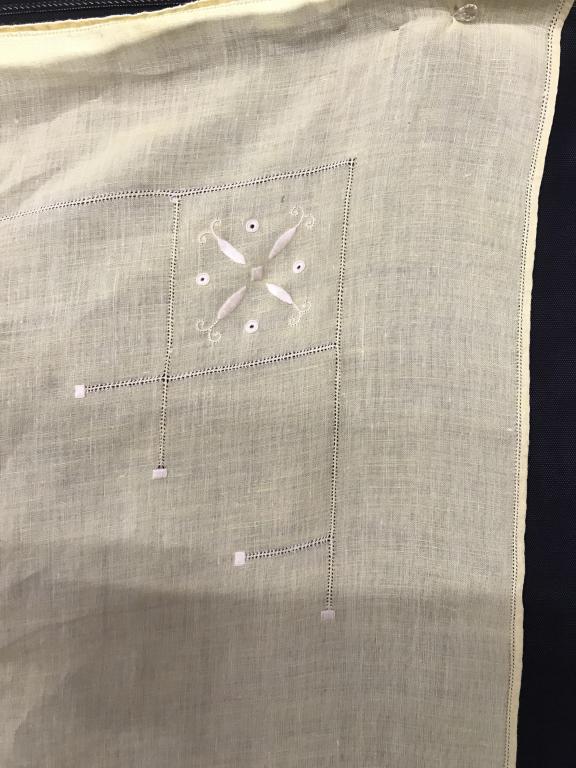 Square Linen Embroidered Tablecloth, Yellow: Size 48.5 x 48.5 in.approx. White embroidery thread on yellow linen background. Material has no rips or pulls. A couple of tiny round spots from previous use. Tablecloth, Linens, Linen Tablecloth, Squ