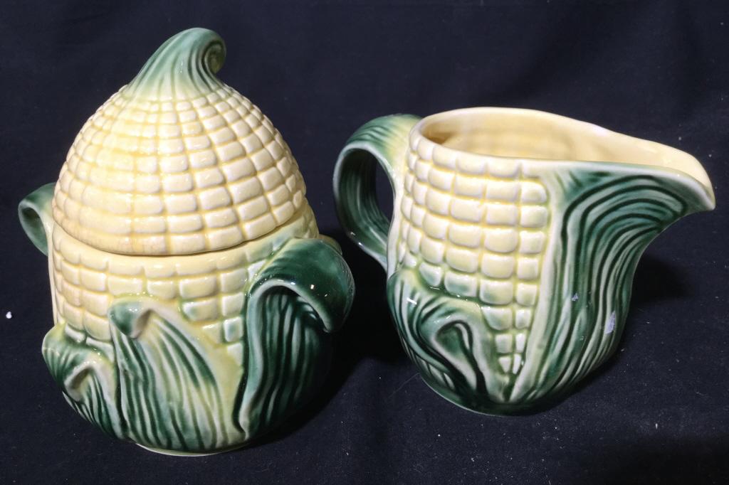 Lot 2 Corn Detailed Creamer & Sugar: Lot includes 1 Creamer and 1 sugar. Each pieces shape resembles and ear of corn. Sugar includes lid. Sugar measures approx 6 inches tall 5 inches wide. cream pitcher and sugar dish, tea service access