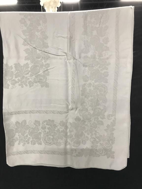 Grey Fruit Motif Tablecloth: Shiny silver grey fabric tablecloth. Fruit Motif. No fabric discoloration except for 1 spot. Measures 66 x 115 in. approx. Up cycle, use for craft projects if desired. Tablecloth, Fruit Motif Tableclo