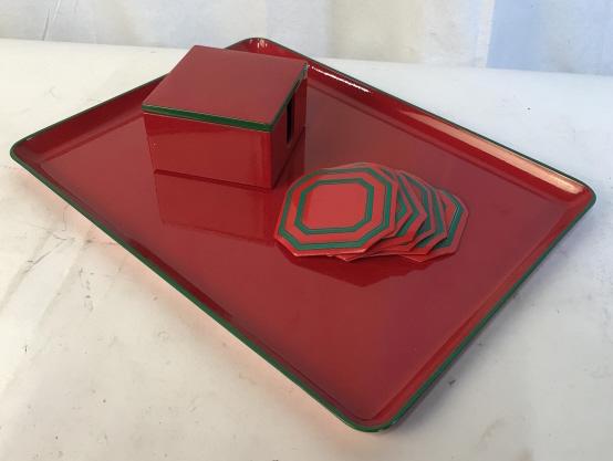 Vintage Holiday Lord & Taylor Serving Tray: Comes with coasters. Set contain 14 pieces. Each piece has a red base with green as an accent color. Tray measures approximately 16 by 12 inches. Coasters measure approximately 4 by 4 inches. Set has