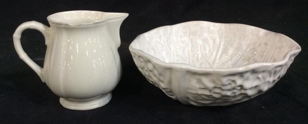Pair Porcelain VILLEROY & BOCH Tableware: Comes with ceramic bowl. Pitcher is slightly chipped at the rim. Ceramic bowl resembles a cabbage. Needs cleaning. Creamer is approximately 4 inches in height. Bowl is approximately 6.5 inches in diam