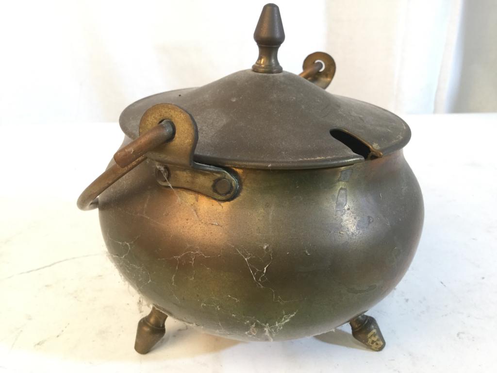 Lot 2 Small Footed Brass Cauldron & Stirrer: Lot includes 1 miniature Cauldron and 1 stirrer. Each appear to be brass. Cauldron Measures approx 8.5 inches tall 6 inches wide. Piece has 3 feet. tableware, tabletop accessory 6