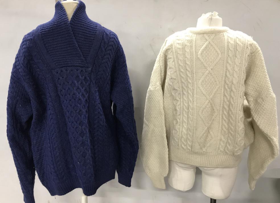 Lot 2 IRISH WOOL ‘Aran’ PULLOVERS, Blue, White: Man or woman’s Blue Cable Knit wide ‘V’ neck pullover sweater. Tag from ‘CARRAIG DONN, Made In Ireland, C.A. NO. 19140, 100% Pure New Wool’. Appears size XL, Long body. Man or Woman’s Whit