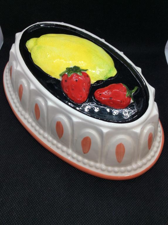 SIGMA Porcelain Jelly Mold: With lemon and strawberry design, possibly hand painted, tag on interior reads SIGMA, measures approx 2 1/2 in by 8 1/2 in by 5 in. porcelain ceramics decorative Kitchenware, jelly Mold, cake molds, a