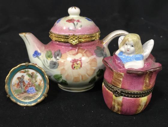 Lot 3 Vintage French Porcelain Pill Boxes and More: Set contains 1 teapot shaped Trinket container, 1 fairy in a flower Trinket container, and 1 small decorative plate marked Limoge Made in France. Teapot is approx 4 inches tall. Teapot marked Formalit